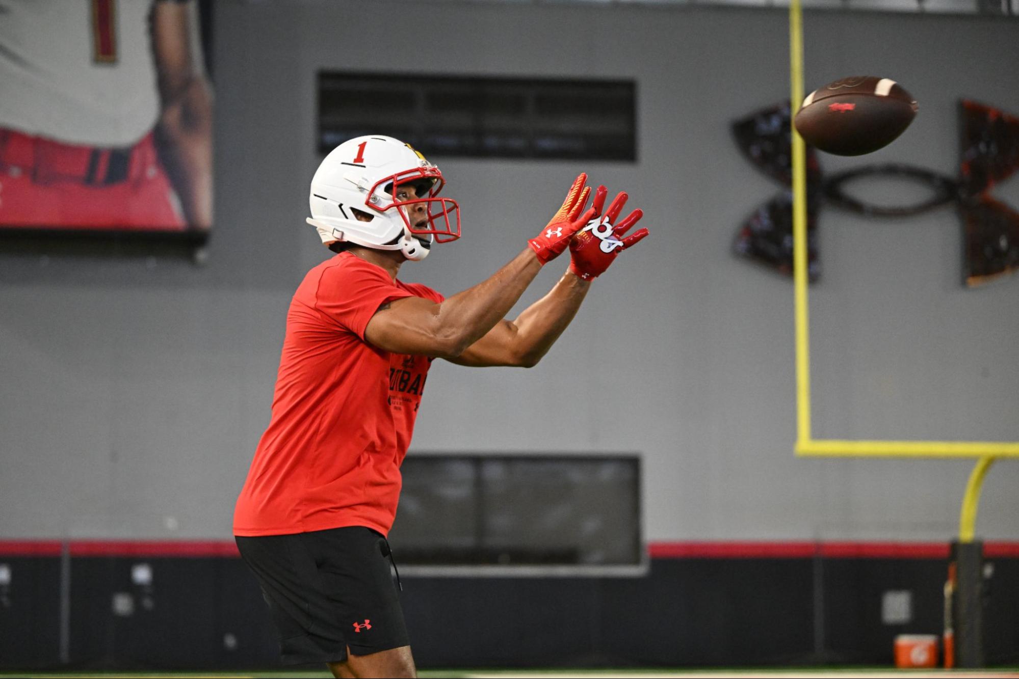 Wes catching a football